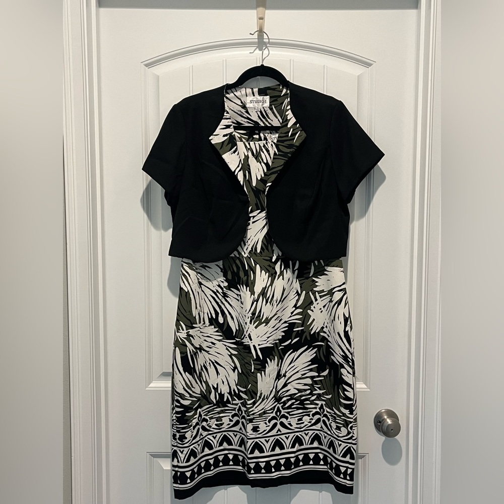 Like New - worn once. Size 14